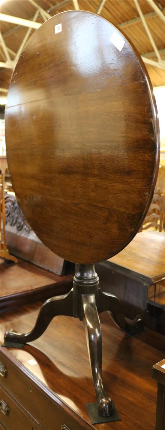 Circular oak tilt top table